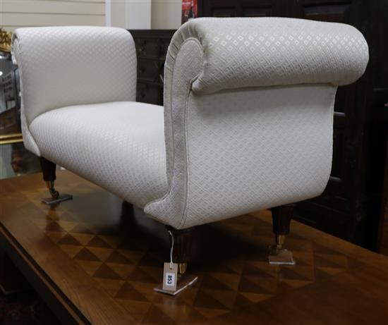 An upholstered window seat W.136cm